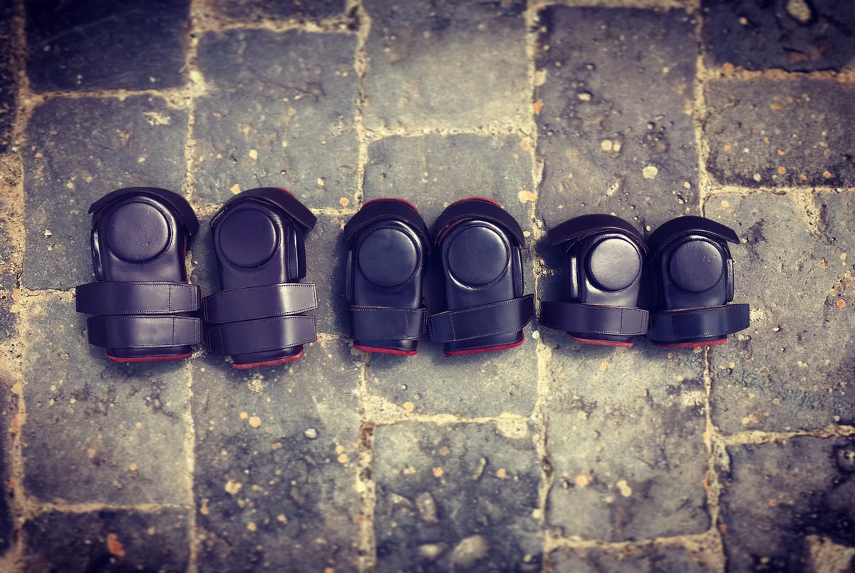 Bombers makes polo knee pads for adults and in kids sizes. 